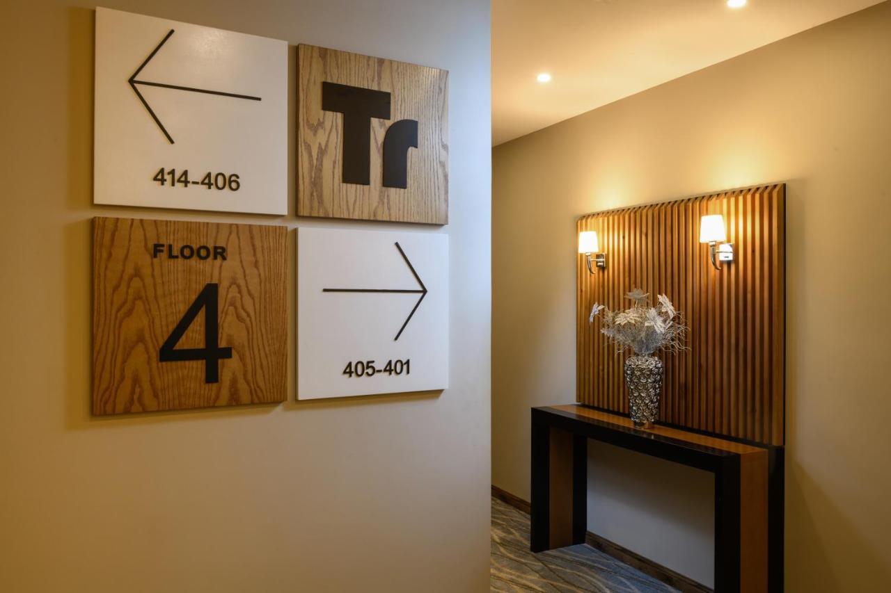 Tripper Inn Hotel Дамам Екстериор снимка