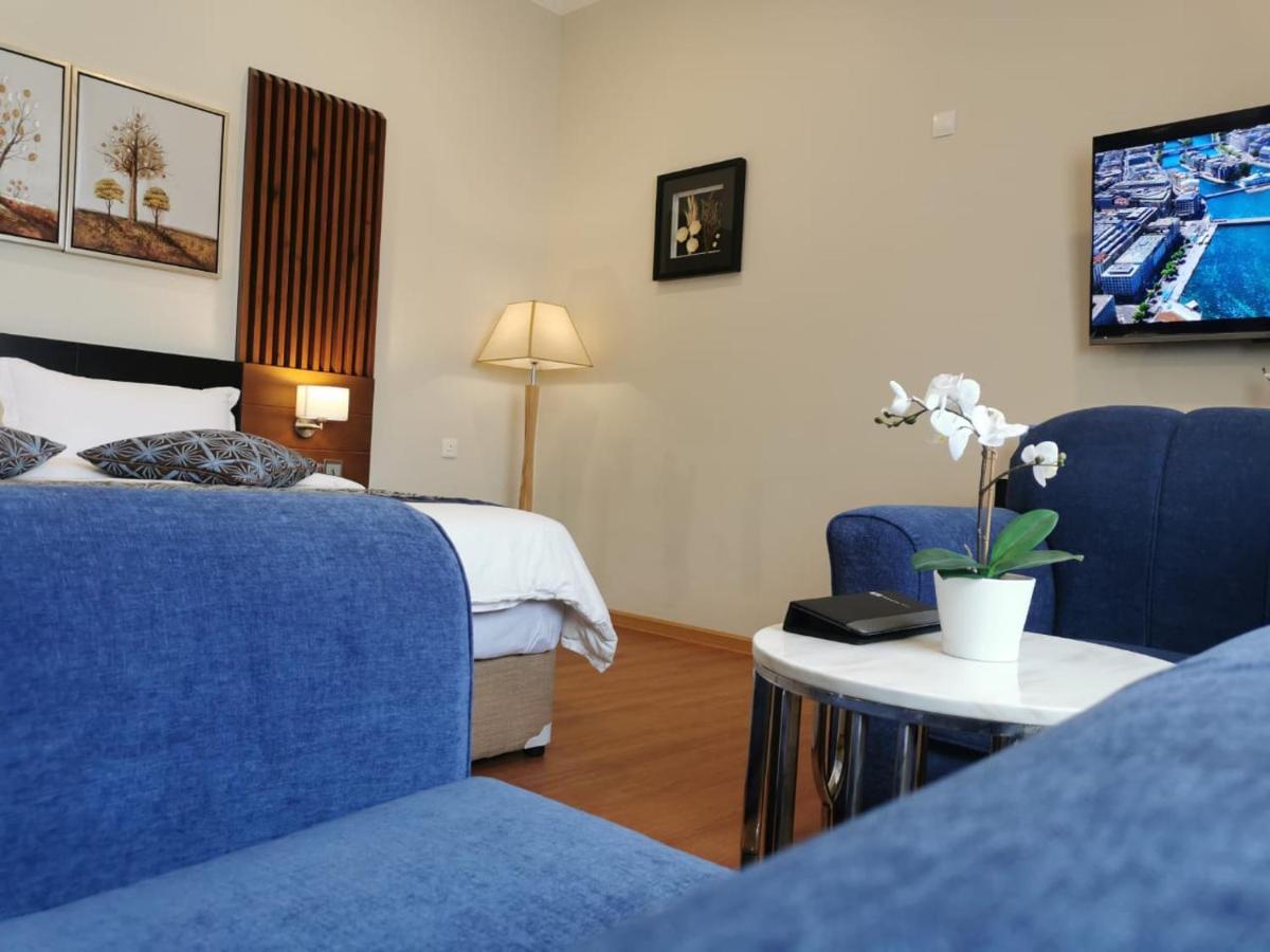 Tripper Inn Hotel Дамам Екстериор снимка