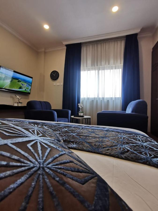 Tripper Inn Hotel Дамам Екстериор снимка