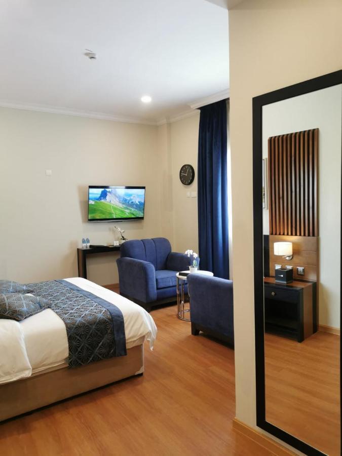 Tripper Inn Hotel Дамам Екстериор снимка
