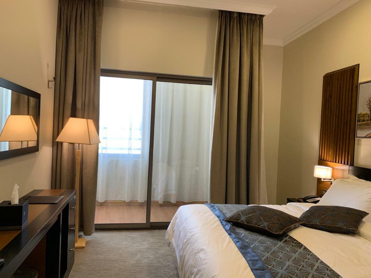 Tripper Inn Hotel Дамам Екстериор снимка