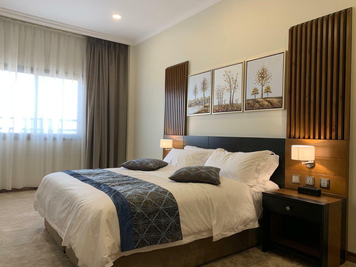 Tripper Inn Hotel Дамам Екстериор снимка