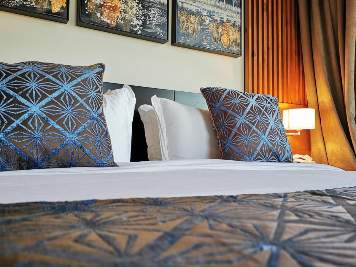 Tripper Inn Hotel Дамам Екстериор снимка